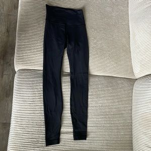 Perfect condition lululemon black leggings size 4